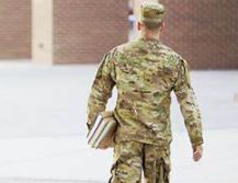 Soldier carrying books