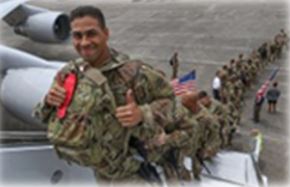 Soliders boarding a plane