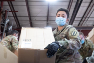 ARNG handling boxes of supplies