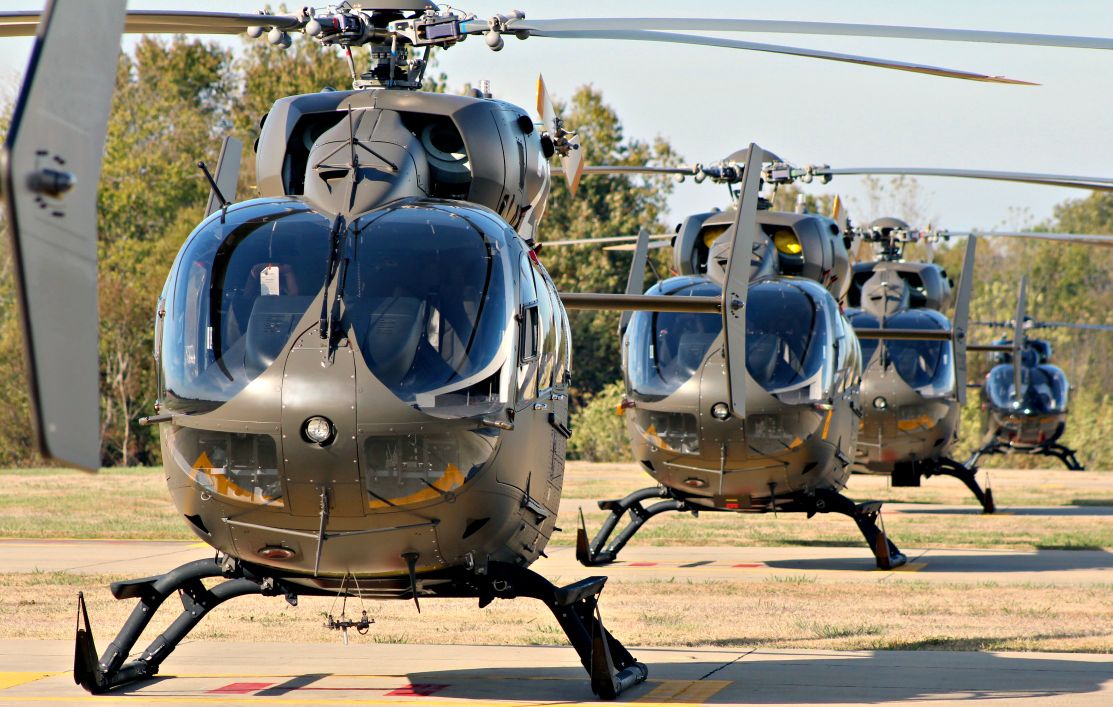 helicopters lined up in a row