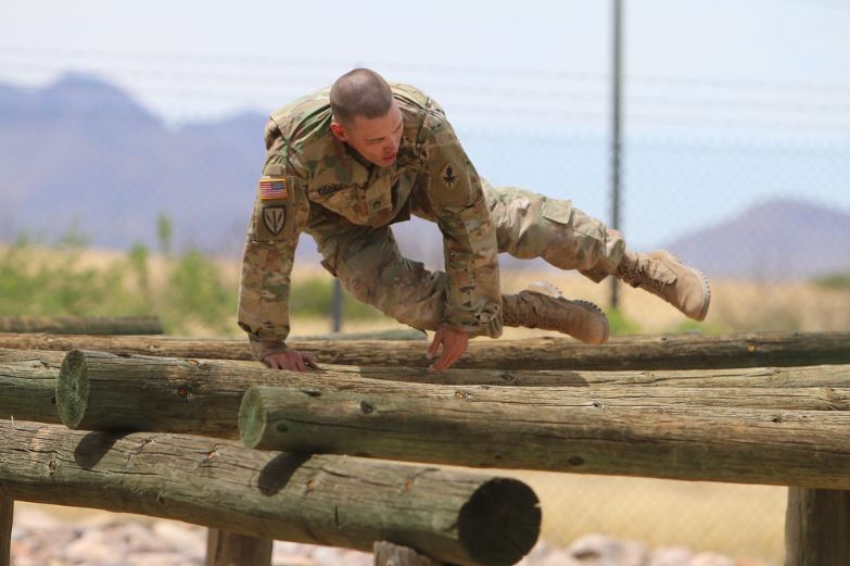 soldier jumping over obstacles