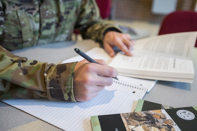 soldier taking notes