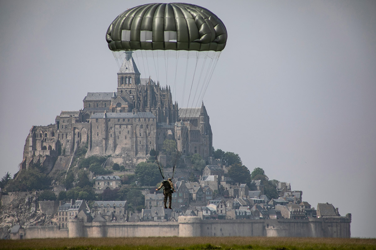 Soldier parachuting into the city