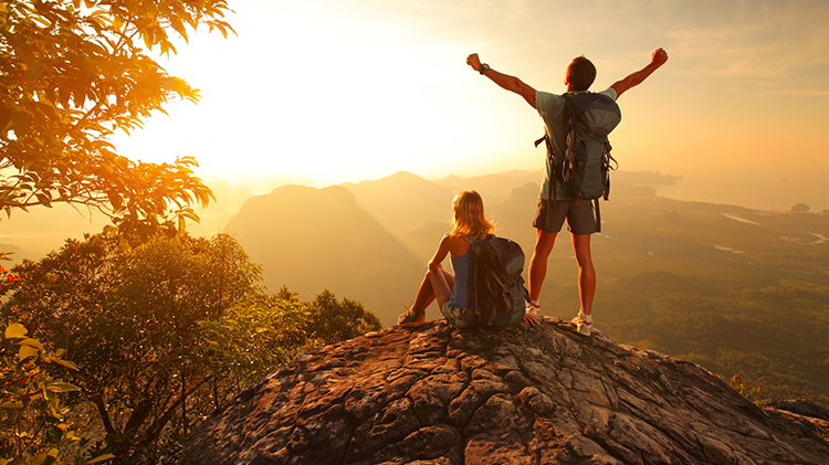 hikers watching a sunset