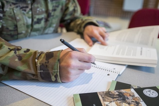 soldier taking notes