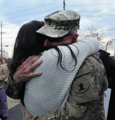 husband and wife hugging