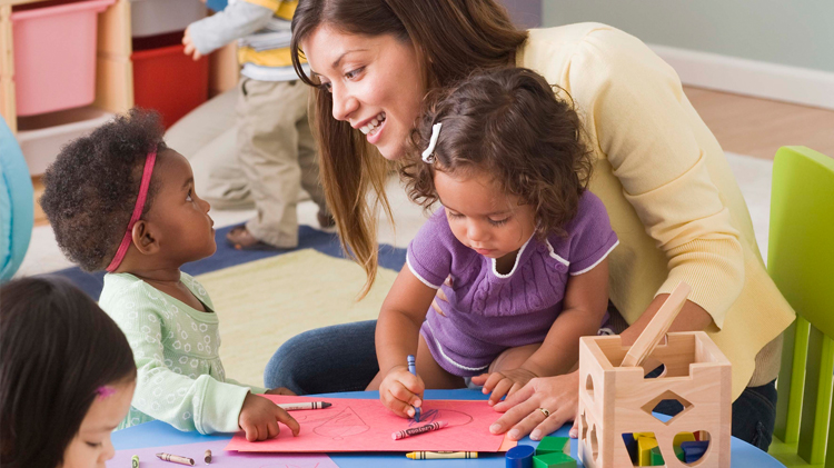 teacher at a daycare with kids