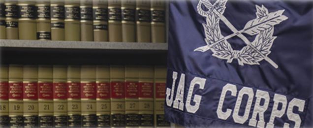 JAG CORPS flag next to law books