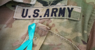 blue ribbon on jacket of a soldier