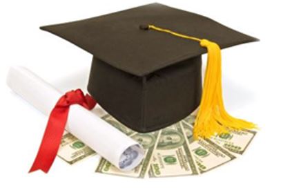 graduation cap on top of a pile of money