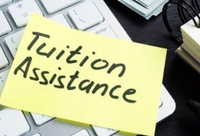 the words tuition assistance on a post it note