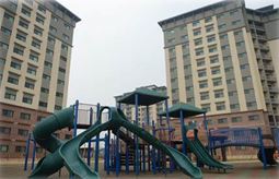 playground outside of 2 apartment buildings