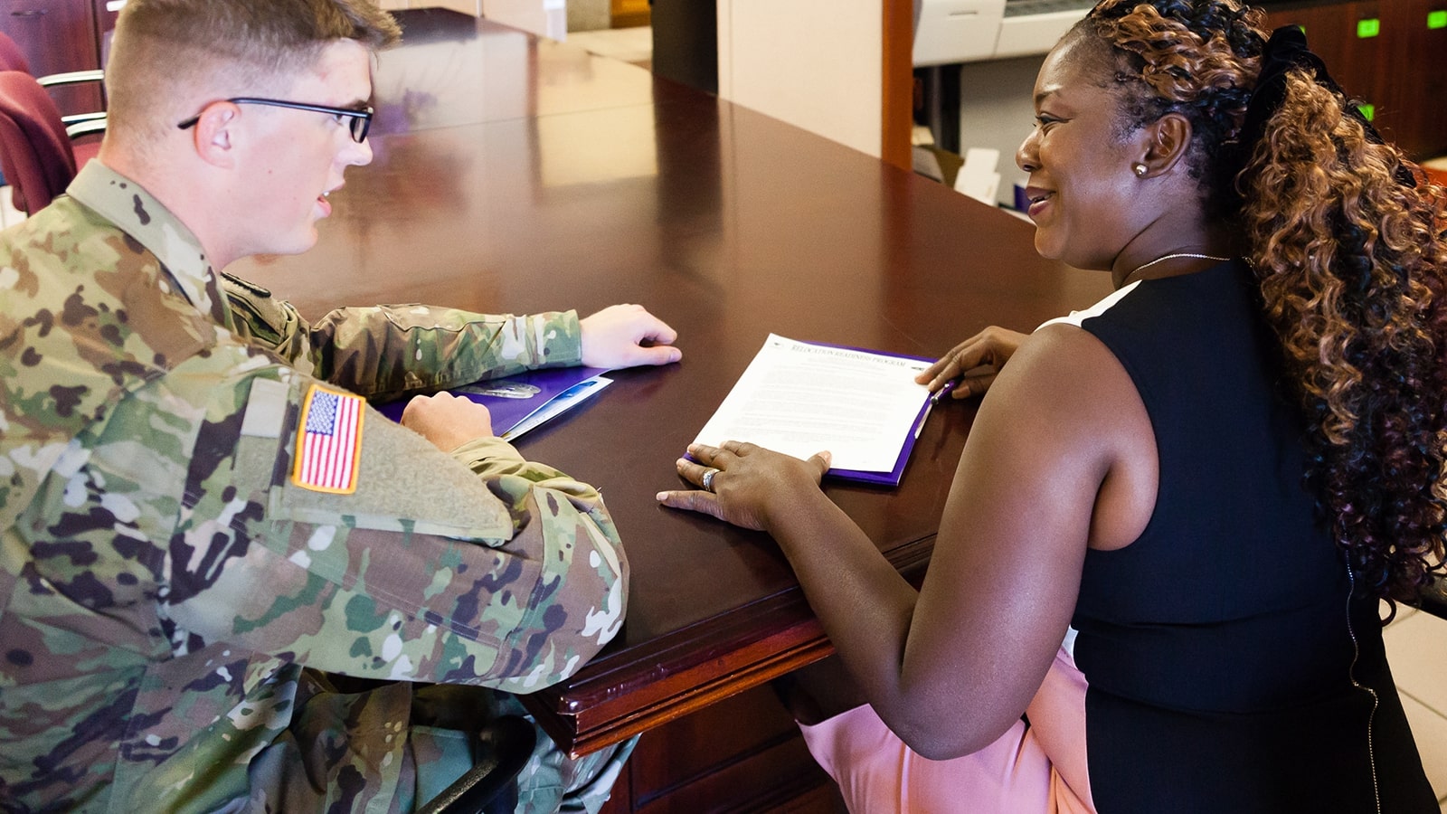 Serviceman talking with an employer