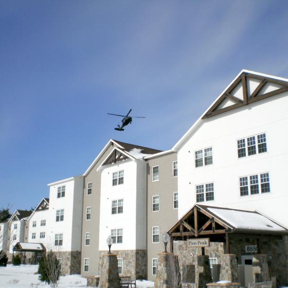 apartment with helicopter flying over