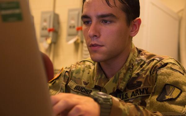 soldier uing a computer