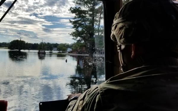 soldier in amphibious vehicle