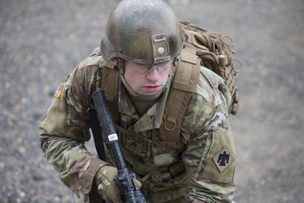 soldier in full gear walking