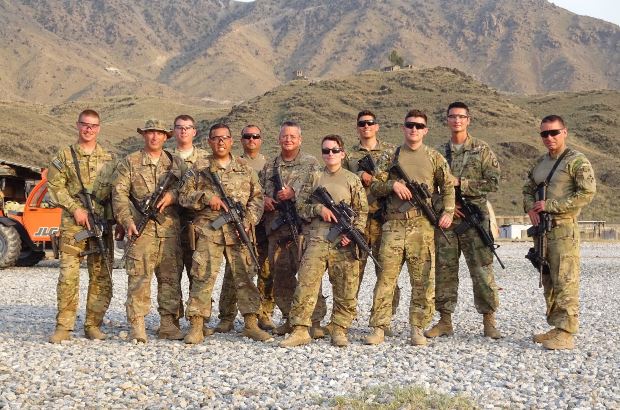 a group of 10 soliders standing together